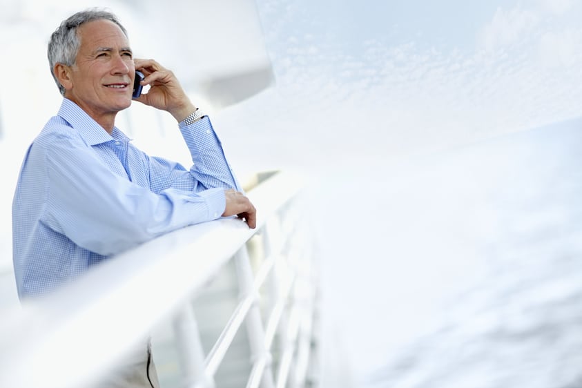 Man Using Phone on Cruise